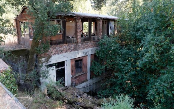 A building on the Alma College site on the Bear Creek Redwoods Open Space Preserve run by the Midpeninsula Regional Open Space District in Los Gatos, Calif., on Tuesday, Sept. 20, 2016. The 1,400-acre expanse of redwood forest, oak woodlands and grassy meadows overlooks the Lexington Reservoir. The property which has been closed to the public for nearly 50 years, will be converted into a public park. (Nhat V. Meyer/Bay Area News Group)